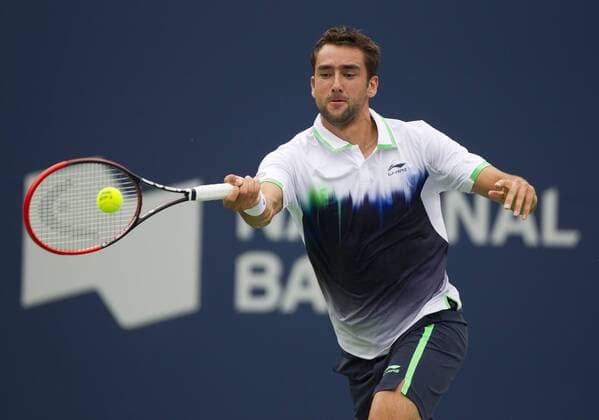 TORONTO, Aug. 4, 2014 -- Marin Cilic of Croatia returns the ball during the first round of men s singles at the 2014 Rogers Cup in Toronto, Canada, Aug. 4, 2014. (SP)CANADA-TORONTO-TENNIS-ROGERS CUP-MEN S SINGLES ZouxZheng 