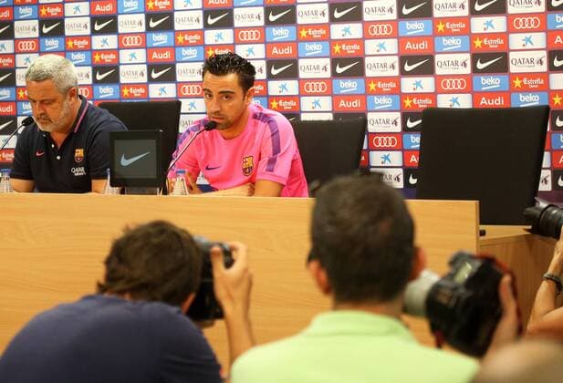 Barcelona, Spain - BARCELONA-SPAIN -05 August: Xavi Hernandez announced in press conference he leaves the spanish national team, after the FC Barcelona training in the field of La Masia, the August 5, 2014.  - ZUMAn23