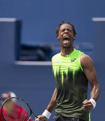 Gael Monfils of France celebrates scoring during the second round of men s singles at the 2014 Rogers Cup in Toronto, Canada, Aug. 6, 2014. CANADA-TORONTO-TENNIS-ROGERS CUP-MEN S SINGLES ZouxZheng 