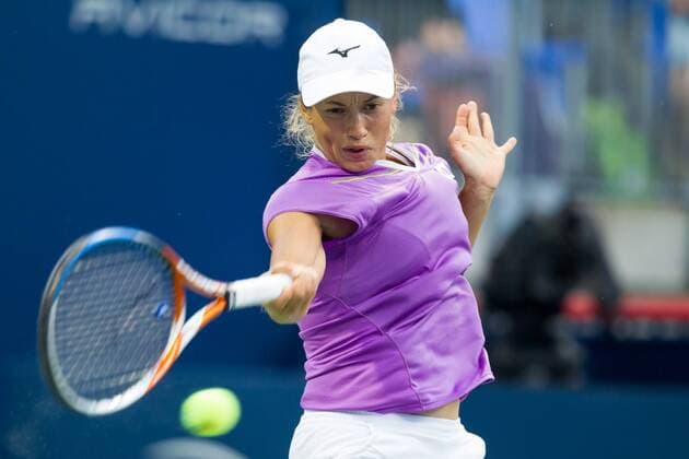 AUG 06, 2014 : Yulia Putintseva (KAZ) returns the ball during her game in the 2nd round of the Rogers Cup presented by National Bank at Uniprix Stadium in Montreal, Quebec, Canada. TENNIS: AUG 06 Rogers Cup - woman Montreal Icon10167 EDITORIAL USE ONLY
