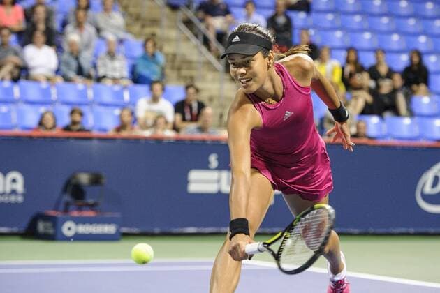 06 August 2014: Ana Ivanovic of Serbia hits a return during the second round of the Rogers Cup Presented by National Bank at Uniprix Stadium in Montreal, Quebec, Canada. TENNIS: AUG 06 Rogers Cup - woman Montreal Icon140806058 EDITORIAL USE ONLY