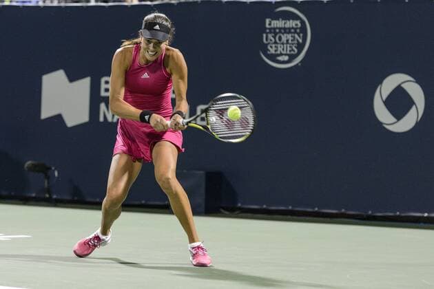 06 August 2014: Ana Ivanovic of Serbia hits a return during the second round of the Rogers Cup Presented by National Bank at Uniprix Stadium in Montreal, Quebec, Canada. TENNIS: AUG 06 Rogers Cup - woman Montreal Icon140806074 EDITORIAL USE ONLY