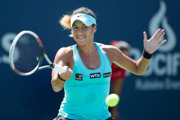 AUG 06, 2014 : Heater Watson (GBR) returns the ball during her game in the 2nd round of the Rogers Cup presented by National Bank at Uniprix Stadium in Montreal, Quebec, Canada. TENNIS: AUG 06 Rogers Cup - woman Montreal Icon14080604 EDITORIAL USE ONLY