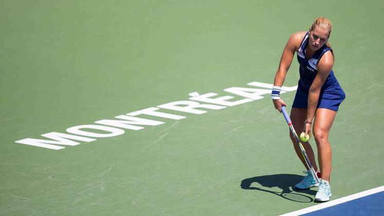 AUG 06, 2014 : Dominika Cibulkova (SVK) serves during her game in the 2nd round of the Rogers Cup presented by National Bank at Uniprix Stadium in Montreal, Quebec, Canada. TENNIS: AUG 06 Rogers Cup - woman Montreal Icon14080608 EDITORIAL USE ONLY