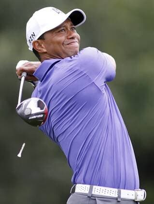 Tiger Woods watches his tee shot on the 17th hole during the first round of The 96th PGA Golf Herren Championship at Valhalla Country Club on August 7, 2014 in Louisville, Kentucky.  LOU2014080707