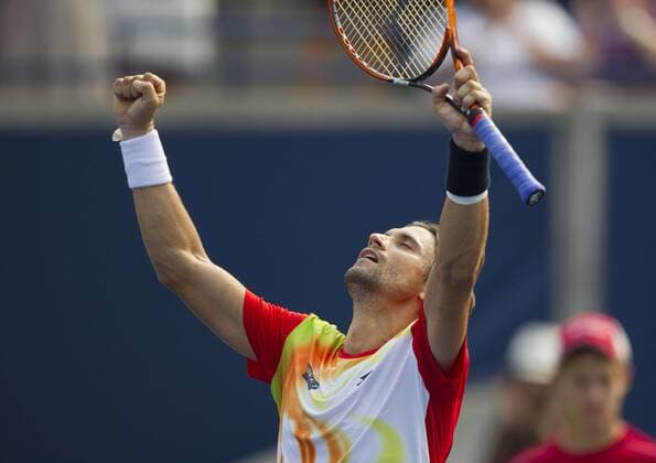 David Ferrer of Spain celebrates victory after the third round of men s singles at the 2014 Rogers Cup in Toronto, Canada, Aug. 7, 2014. 