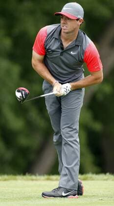 Rory McIlroy, of Northern Ireland, watches hit tee shot on the fifth hole during the first round of the 96th PGA Golf Herren Championship at Valhalla Country Club on .August 7, 2014 in Louisville, Kentucky. Westwood sank the birdie to shoot a six-under 65 and currently has a one stroke lead.  LOU2014080720