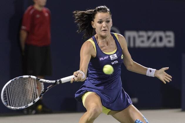 07 August 2014: Agnieszka Radwanska of Poland hits a return during the third round of the Rogers Cup Presented by National Bank at Uniprix Stadium in Montreal, Quebec, Canada. Icon10614 EDITORIAL USE ONLY