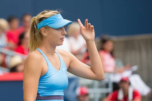 August 7th, 2014, Tennis player Maria Sharapova (RUS) challenges a call in the second round at the Rogers Cup tournament at the Uniprix Stadium in Montreal, Quebec, Canada. Icon10616 EDITORIAL USE ONLY