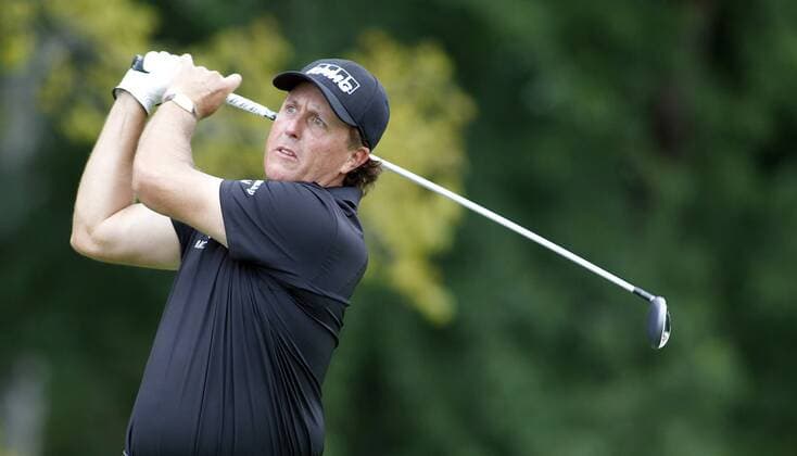 Phil Mickelson, of the United States, watches his tee shot on the fifth hole during the second round of the 96th PGA Golf Herren Championship at Valhalla Country Club on .August 8, 2014 in Louisville, Kentucky.  LOU2014080812