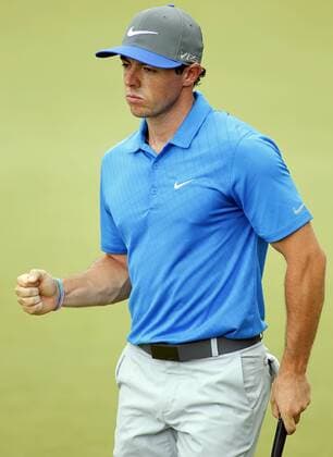 Rory McIlroy, of Northern Ireland, reacts to saving par on the fourth hole during the third round of the 96th PGA Golf Herren Championship at Valhalla Country Club on .August 9, 2014 in Louisville, Kentucky.  LOU201408090111