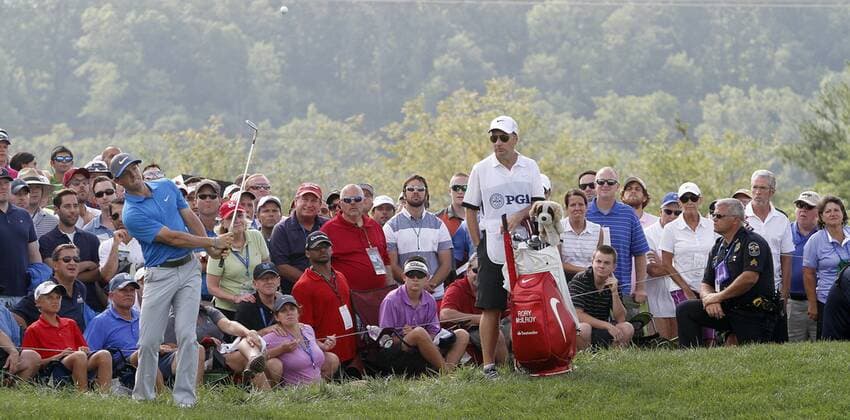 Rory McIlroy, of Northern Ireland, chips onto the ninth green during the third round of the 96th PGA Golf Herren Championship at Valhalla Country Club on .August 9, 2014 in Louisville, Kentucky. McIlroy shot a four under par 67 and has a one stroke lead over Austria s Bernd Wiesberger heading into Sunday s final round.  LOU2014080908