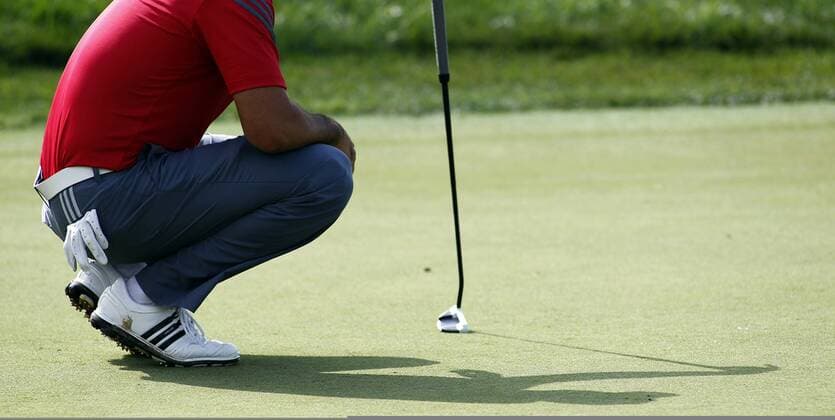 Jason Day, of Australia, lines up a putt on the ninth hole during the third round of the 96th PGA Golf Herren Championship at Valhalla Country Club on .August 9, 2014 in Louisville, Kentucky. Day shot two under par 69 and trails leader Rory McIlroy by three strokes entering Sunday s final round.  LOU2014080911