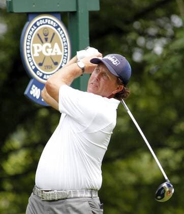 Phil Mickelson, of the United States, hits his tee shot to the second hole during the third round of the 96th PGA Golf Herren Championship at Valhalla Country Club on August 9, 2014 in Louisville, Kentucky. Mickelson shot a four under par 67 and trails leader Rory McIlroy by three strokes entering Sunday s final round.  LOU2014080917