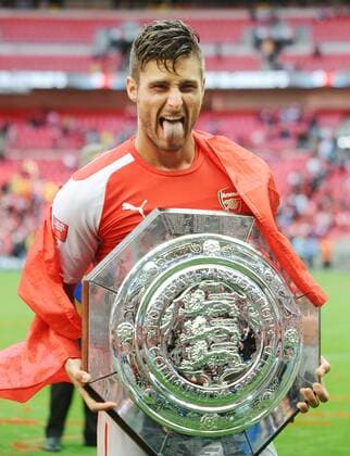 Football - 2014 FA Community Shield - Arsenal vs. Manchester City Arsenal s Olivier Giroud with the shield at Wembley. COLORSPORT ANDREW COWIE 