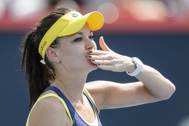 10 August 2014: Agnieszka Radwanska of Poland acknowledges the fans in the final round of the Rogers Cup Presented by National Bank at Uniprix Stadium in Montreal, Quebec, Canada. TENNIS: AUG 10 Rogers Cup - Montreal Icon11266 EDITORIAL USE ONLY