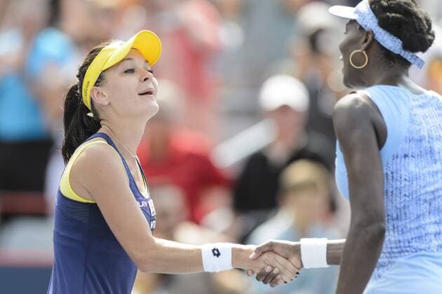 10 August 2014: Agnieszka Radwanska of Poland shakes hands with her opponent Venus Williams of the United States after defeating her 6-4, 6-2 and winning the Rogers Cup Presented by National Bank at Uniprix Stadium in Montreal, Quebec, Canada. TENNIS: AUG 10 Rogers Cup - Montreal Icon11257 EDITORIAL USE ONLY