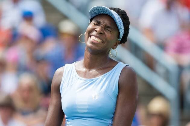 AUG 10, 2014 : Venus Williams (USA) reacts presented by National Bank at the Uniprix Stadium in Montreal, Quebec, Canada. Rogers Cup. TENNIS: AUG 10 Rogers Cup - Montreal Icon11265 EDITORIAL USE ONLY