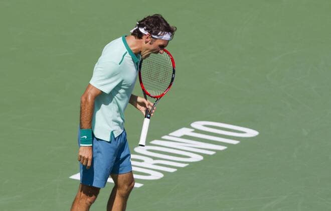 (140811) -- TORONTO, Aug. 10, 2014 -- Roger Federer of Switzerland reacts during the final of men s singles Rogers Cup 