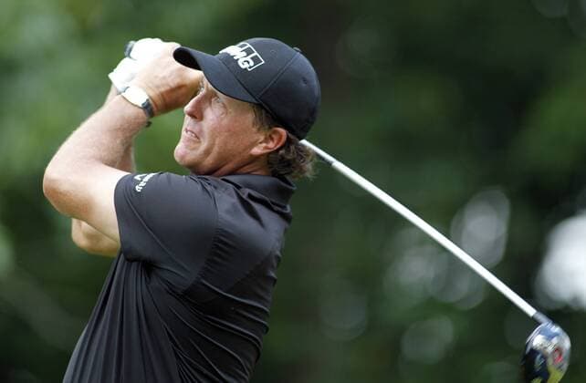 Phil Mickelson, of the United States, watches his tee shot on the second hole during the final round of the 96th PGA Golf Herren Championship at Valhalla Country Club on August 10, 2014 in Louisville, Kentucky.  LOU2014081009