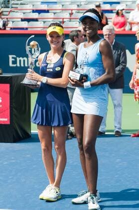 Aug 10, 2014 - Montreal, Quebec, Canada - AGNIESZKA RADWANSKA of Poland celebrates with the trophy after defeating VENUS WILLIAMS of the USA during the women s finals match at Uniprix Stadium in Montreal, Canada. Tennis 2014 - Rogers Cup - ZUMAk12