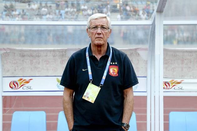 DALIAN, CHINA - AUGUST 13: (CHINA OUT) Marcello Lippi, head coach of Guangzhou Evergrande, in action during the Chinese Super League match between Dalian Aerbin and Guangzhou Evergrande at Dalian Sports Center on August 13, 2014 in Dalian, Liaoning Province of China.  CFP456009882 