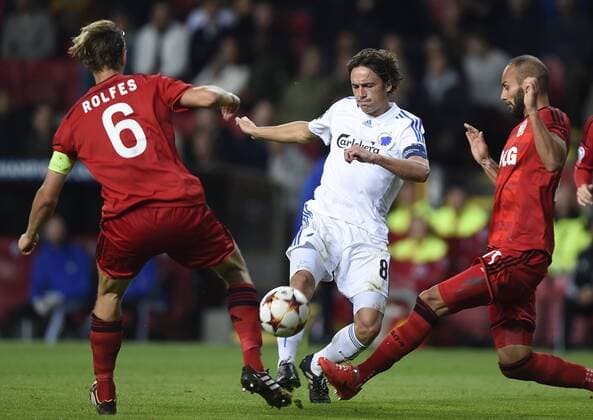 Copenhagen, Denmark, football, UEFA Champions League qualification: FC Copenhagen - Bayer Leverkusen. Simon Rolfes, Bayer Leverkusen, Keeper Johan Wiland, FC Copenhagen, Ömer Toprak, Bayer Leverkusen 