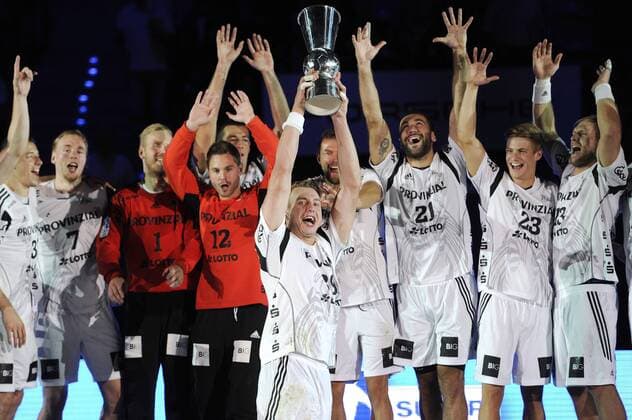 Filip JICHA (Kiel) mit dem Pokal,Cup,Trophy,Siegerehrung, Teamfoto,Team,Mannschaft,Mannschaftsfoto THW Kiel,Jubel,Freude,Begeisterung,Sieger,winner. Handball Supercup THW Kiel 24-18. Handball Bundesliga,Saison 2014 2015,am 19.08.2014..