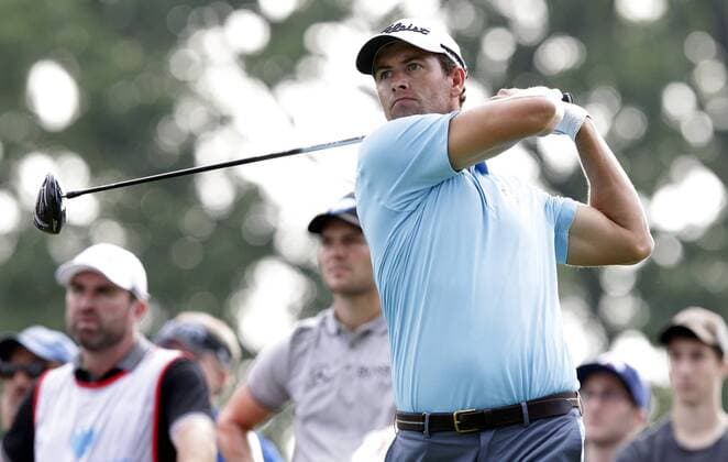 Adam Scott hits a tee shot on hole 13 in the first round at The Barclays at Ridgewood Country Club in Paramus, NJ on August 21, 2014. The Barclays this year returns to the Championship Course at the historic Ridgewood Country Club, site of The Barclays 2008 and 2010 championship.  NYP20140821107