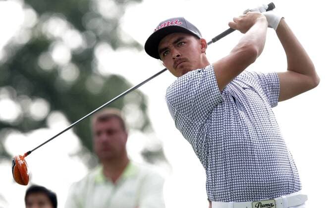 Rickie Fowler hits his tee shot on hole 13 in the first round at The Barclays at Ridgewood Country Club in Paramus, NJ on August 21, 2014. The Barclays this year returns to the Championship Course at the historic Ridgewood Country Club, site of The Barclays 2008 and 2010 championship.  NYP20140821108