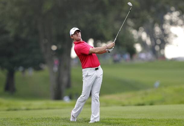 Rory McIlroy hits out of the rough on hole 13 in the first round at The Barclays at Ridgewood Country Club in Paramus, NJ on August 21, 2014. The Barclays this year returns to the Championship Course at the historic Ridgewood Country Club, site of The Barclays 2008 and 2010 championship.  NYP20140821113