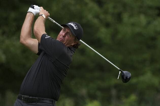Aug. 22, 2014 - Paramus, New Jersey, U.S - August 22, 2014: Phil Mickelson (USA) hits the tee into the air as he drives the ball on the 5th hole during the second round of The Barcla s Fed Ex Championship at Ridgewood Country Club in Paramus, NJ. Mandatory Credit: Kostas Lymperopoulos csm GOLF 2014: The Barcla s Fed Ex Championship AUG 22 - ZUMAc04