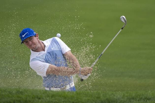 Aug. 23, 2014 - Paramus, New Jersey, U.S - August 23, 2014: Rory McIlroy (NIR) sprays sand as he hits out of a bunker on the 13th hole during the third round of The Barclays Fed Ex Championship at Ridgewood Country Club in Paramus, NJ. Mandatory Credit: Kostas Lymperopoulos csm GOLF 2014: The Barclays Fed Ex Championship AUG 23 - ZUMAc04