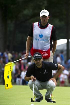 Aug. 23, 2014 - Paramus, New Jersey, U.S - August 23, 2014: Cameron Tringale (USA) and his caddy looks over a putt on the 18th green during the third round of The Barclays Fed Ex Championship at Ridgewood Country Club in Paramus, NJ. Mandatory Credit: Kostas Lymperopoulos csm GOLF 2014: The Barclays Fed Ex Championship AUG 23 - ZUMAc04