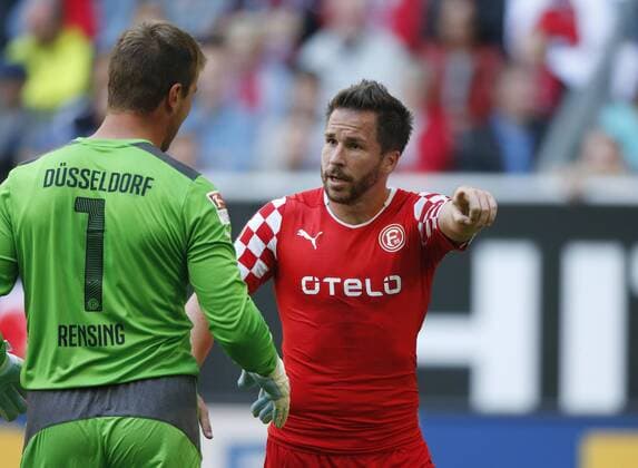 Düsseldorf, Germany, Esprit-Arena, 23.08.2014 Fußball, DFL, DFB, Saison 2014 2015, 3. Spieltag Fortuna Düsseldorf : Karlsruher SC 0:2 am 23. 08. 2014 in der Esprit-Arena in Düsseldorf Torwart Michael RENSING (F95) li.- und Christian WEBER (F95) re.-