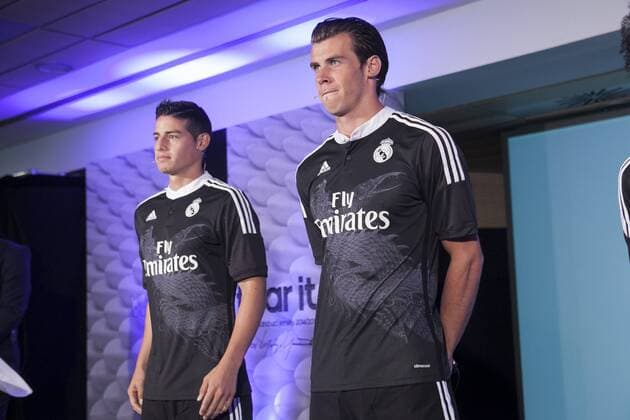 James Rodriguez and Gareth Bale during the presentation of the Real Madrid s new Champions League kit at the Santiago Bernabeu stadium in Madrid, Spain. May 26, 2013.  (2014082621021)