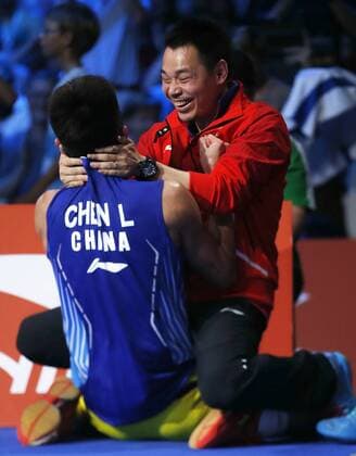 (140901) -- COPENHAGEN, -- Chen Long of China celebrates with his coach Xia Xuanze(R) after the Men s Singles Final against Lee Chong Wei of Malaysia on Day 7 of Li Ning BWF World Championships 2014 at Ballerup Super Arena in Copenhagen, Denmark on Aug. 31, 2014. Chen Long of China clamied the title by defeating Lee Chong Wei of Malaysia with 2-0(21-19, 21-19). ) (SP)DENMARK-COPENHAGEN-BADMINTON-WORLD CHAMPIONSHIPS-DAY 7 WangxLili 