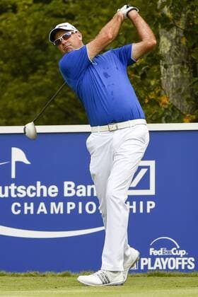 Aug. 31, 2014 - Norton, Massachusetts, USA - August 31, 2014 - Norton, Mass. - Stewart Cink watches the flight of his ball down the 4th fairway during the third round of the PGA Golf Herren FedEx Cup playoffs, Deutsche Bank Championship, held at the Tournament Players Club in Norton Massachusetts. Eric Canha CSM Golf 2014: Deutsche Bank Championship AUG 31 - ZUMAc04
