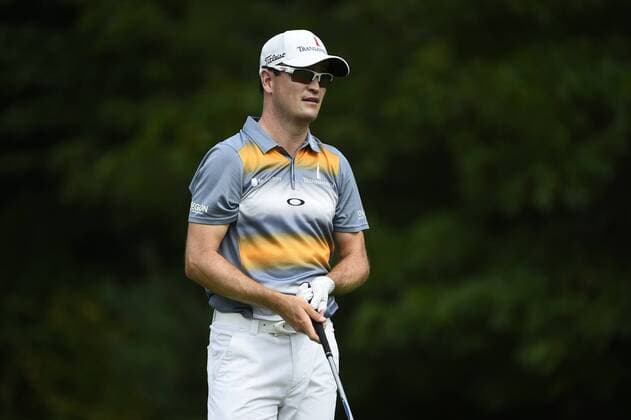 Aug. 31, 2014 - Norton, Massachusetts, USA - August 31, 2014 - Norton, Mass. - Zach Johnson leaves the 14th tee box during the third round of the PGA Golf Herren FedEx Cup playoffs, Deutsche Bank Championship, held at the Tournament Players Club in Norton Massachusetts. Eric Canha CSM Golf 2014: Deutsche Bank Championship AUG 31 - ZUMAc04