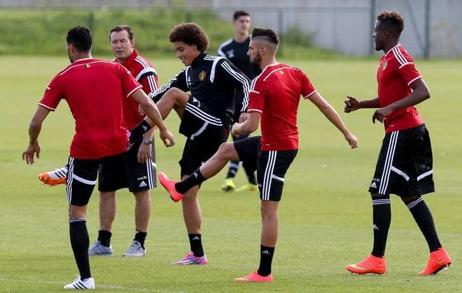 20140901 - BRUSSELS, BELGIUM: Belgium s head coach Marc Wilmots, Belgium s Axel Witsel and Belgium s Yannick Ferreira Carrasco pictured during a training session of Belgian national soccer team Red Devils, Monday 01 September 2014, in Brussels. Belgium will play a friendly match against the Australian national soccer team on Thursday. VIRGINIExLEFOUR  premiumd Highlight 04295534