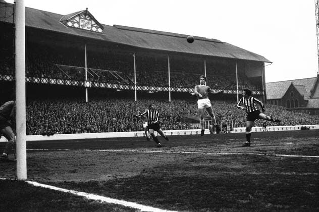 Football - 1967 1968 First Division - Everton 1 Newcastle United 0 Everton s Joe Royle heads goalwards at Goodison Park. The Goodison Road Stand can be seen in the background. 23 03 1968 