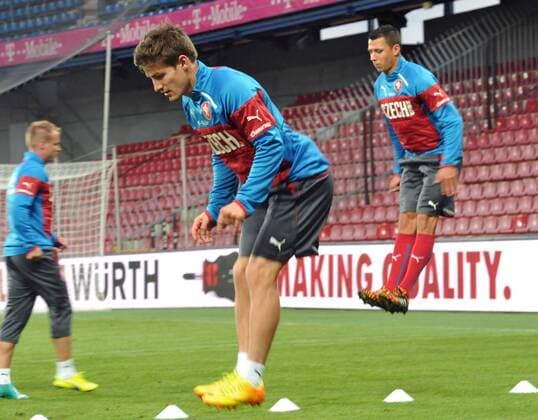 Czech Republic national team trains prior to the soccer friendly match Czech Republic vs USA on September 2, 2014 in Prague, Czech Republic. Pictured half-back Vaclav Pilar (centre) and defender Marek Suchy (right). (CTKxPhoto MichalxDolezal) CTKPhotoOF201409020893201  dol 003