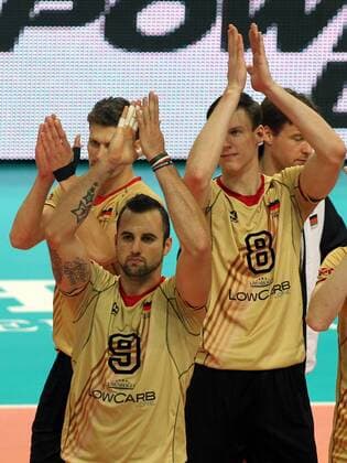 03.09.2014 Katowice(Poland) FIVB Men s Volleyball World Championship Cuba-Germany Pool B György Grozer(L) with Marcus Böhme(r) Germany celebrate victory after match : 