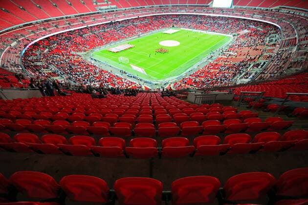 A general view of Wembley with plenty of empty seats as the teams line up - International Friendly - England - Wembley Stadium - England - 3rd September 2014 - EDITORIAL USE ONLY. No use with unauthorised audio, video, data, fixture lists, club league logos or live services. Online in-match use limited to 120 images, no video emulation. No use in betting, games or single club league player publications.