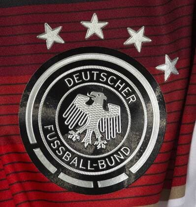 Four stars adorn the DFB crest - Germany - International Friendly - Esprit Arena - Dusseldorf - 03 09 2014 EDITORIAL USE ONLY. No use with unauthorised audio, video, data, fixture lists, club league logos or live services. Online in-match use limited to 120 images, no video emulation. No use in betting, games or single club league player publications.