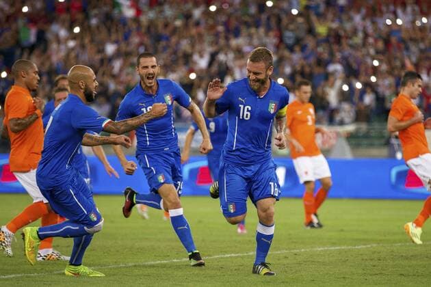 (L-R) Nigel de Jong of Holland, Simone Zaza of Italy, Leonardo Bonucci of Italy, Daniele De Rossi of Italy during the friendly match between Italy and The Netherlands on September 4, 2014 at Stadio San Nicola in Bari, Italy. Italy v Netherlands International Friendly 2014 2015 xVIxxIVx 2603882