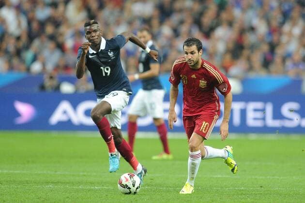 Paul Pogba (FRA) Cesc Fabregas (ESP) FOOTBALL : France vs Spain - 04 09 2014 N.LeGouicFEP 