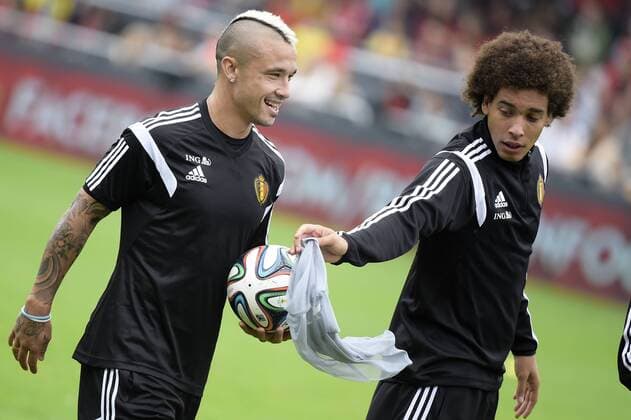- OOSTENDE, BELGIUM: Belgium s Radja Nainggolan and Belgium s Axel Witsel pictured during a training session of Belgian national soccer team Red Devils, Saturday 06 September 2014, in Oostende. YORICKxJANSENS  premiumd 04309133