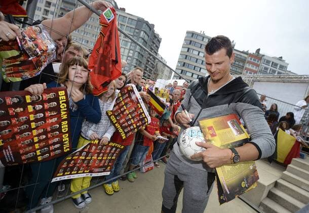 - OOSTENDE, BELGIUM: Former Red Devil Daniel Van Buyten signs an autograph at a fan day of Belgian national soccer team Red Devils, Saturday 06 September 2014, in Oostende. YORICKxJANSENS  premiumd 04309215