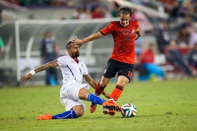 September 06, 2014: Chile midfielder Arturo Vidal (8) tackles Mexico midfielder Andres Guardado (18), during the game between Mexico and Chile at Levi s Stadium in Santa Clara. SOCCER: SEP 06 Mexico v Chile Icon20140906027 EDITORIAL USE ONLY